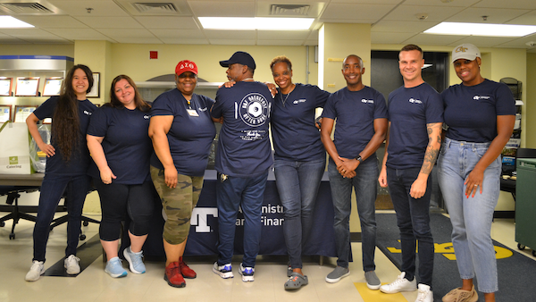 A&F staff posing at an event