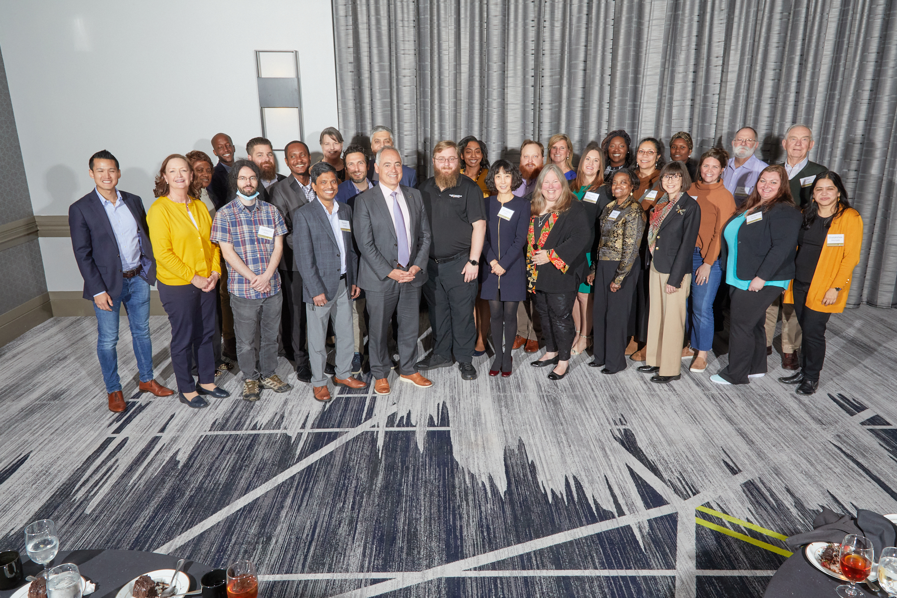 President Cabrera poses with recipients of the 10-Year Service Award. April 19, 2022