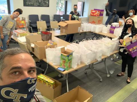 group of people bagging treats